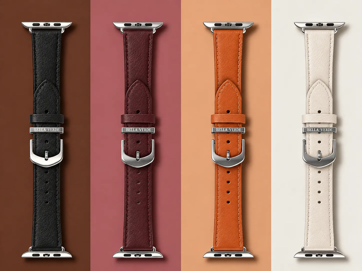 Four leather watch straps displayed vertically side by side on a split-color background. The straps are black, burgundy, orange, and cream, each with silver metal hardware and a silver buckle engraved with the brand name 'HAYABUSA'.